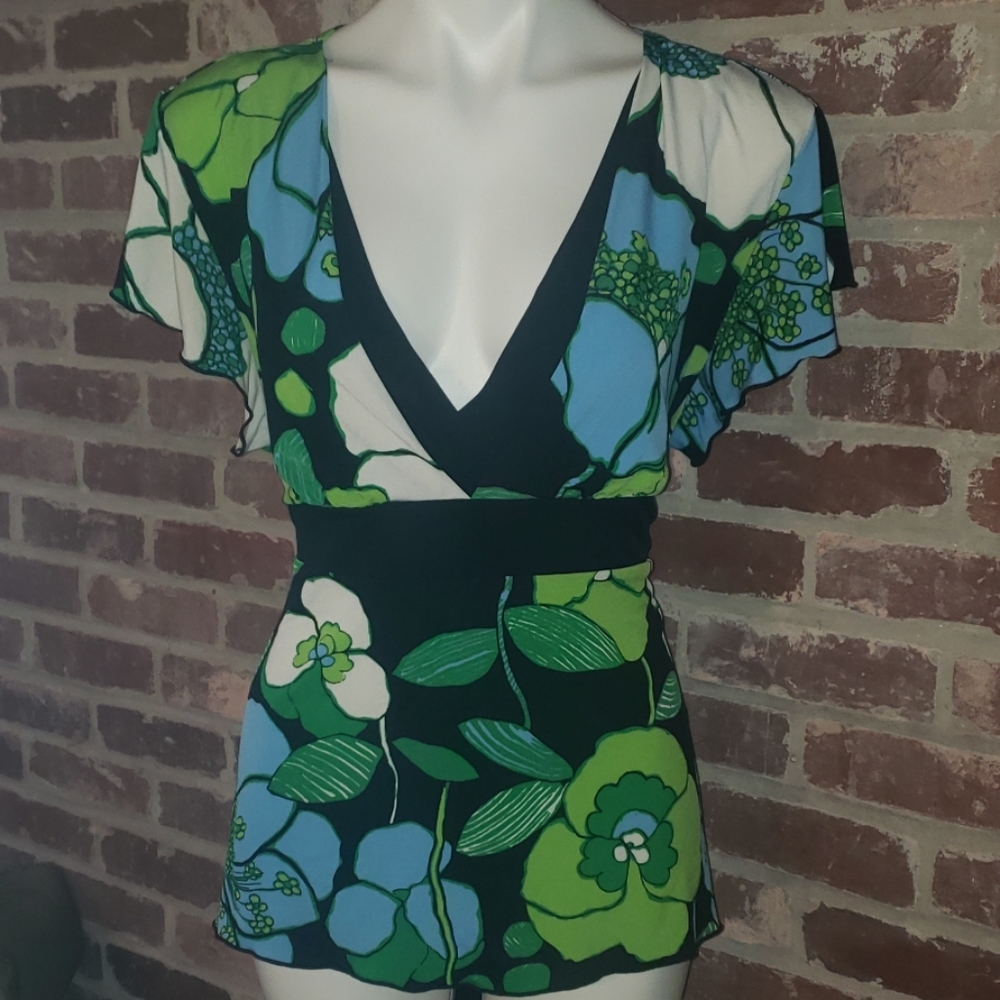 Nice silky blouse. Dress it up or down.